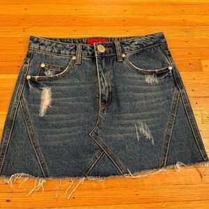 Signature 8 denim ripped mini skirt